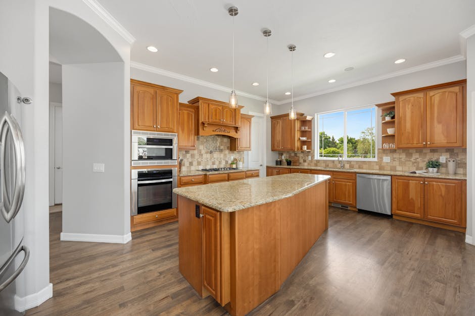 Custom wooden kitchen cabinets installed in a modern home